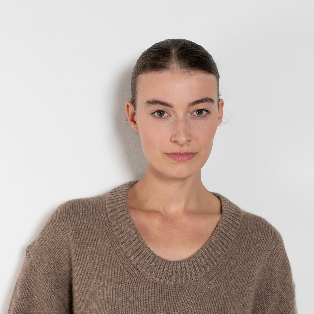The Derry Sweater by Loulou Studio is an relaxed sweater with an ample fit, a deep U, dropped shoulders and ribbed details in a thicker cashmere