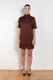 The Elton Mini Dress by Loulou Studio is a mini dress with a high standing collar and two side pockets