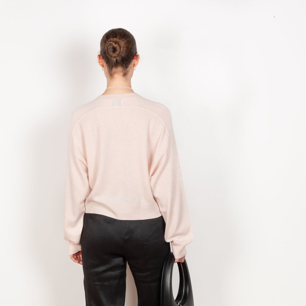 The Emsalo V-Neck Sweater by Loulou Studio is a v-neck pullover with feminine sleeves in a soft cashmere