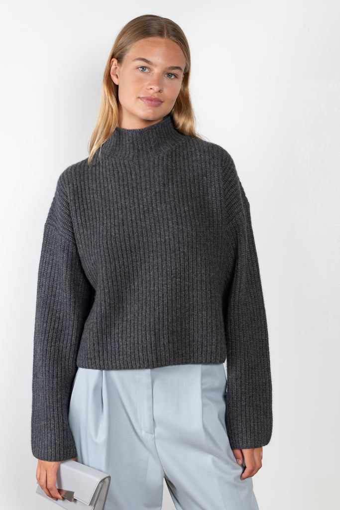The Faro Sweater by Loulou Studio is a relaxed boxy sweater with a high funnel neck in a soft cashmere