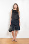 The Isu Short by Loulou Studio is a mid rise jeans short with bermuda-like proportions