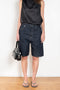 The Isu Short by Loulou Studio is a mid rise jeans short with bermuda-like proportions