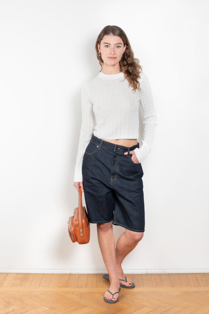 The Isu Short by Loulou Studio is a mid rise jeans short with bermuda-like proportions