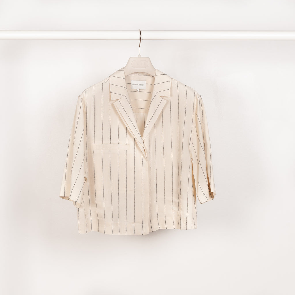 The Lago Cropped Shirt by Loulou Studio is an oversized cropped shirt