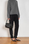 The Malka Trouser by Loulou Studio is a slightly fitted trouser with a low waistband