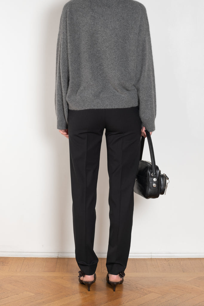 The Malka Trouser by Loulou Studio is a slightly fitted trouser with a low waistband