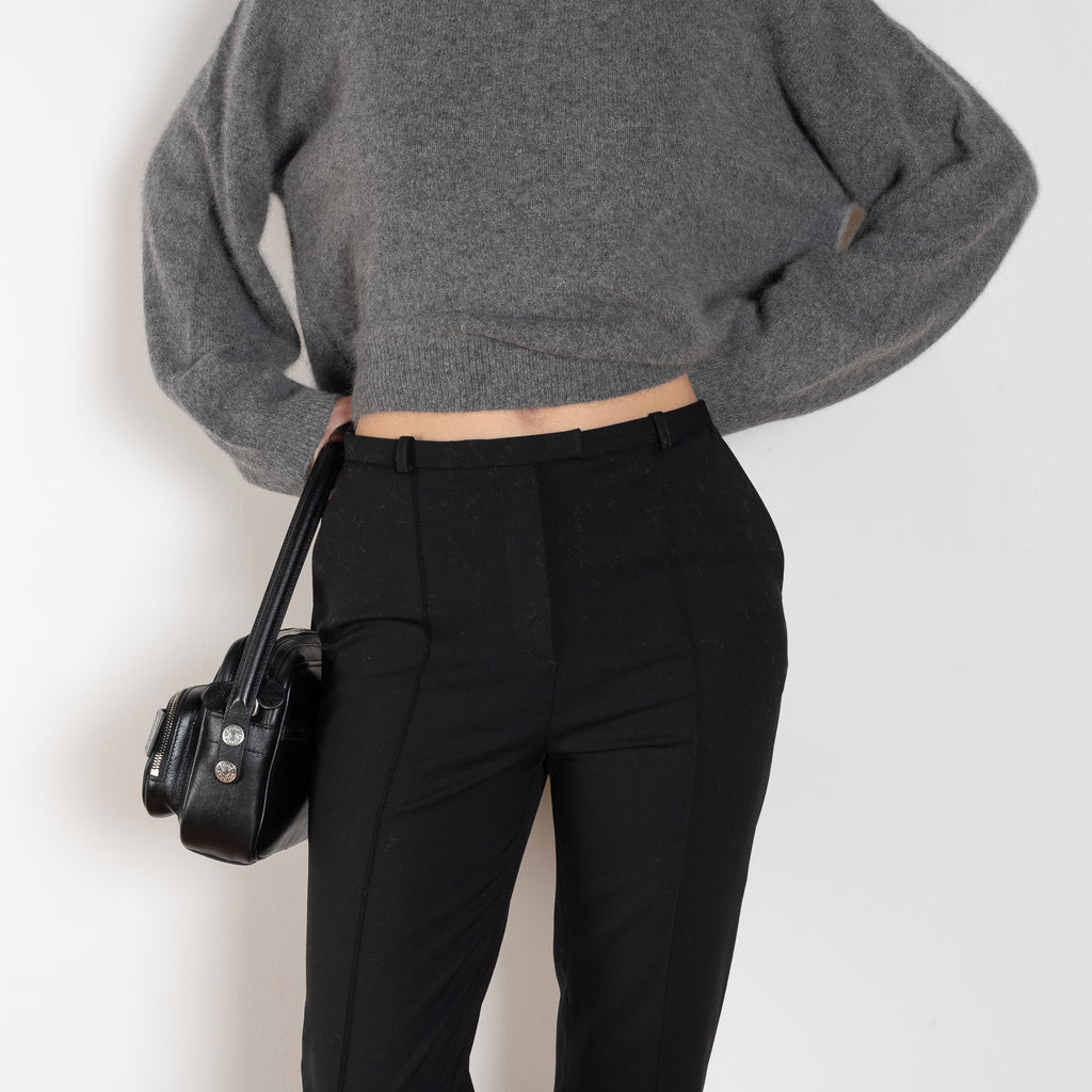 The Malka Trouser by Loulou Studio is a slightly fitted trouser with a low waistband