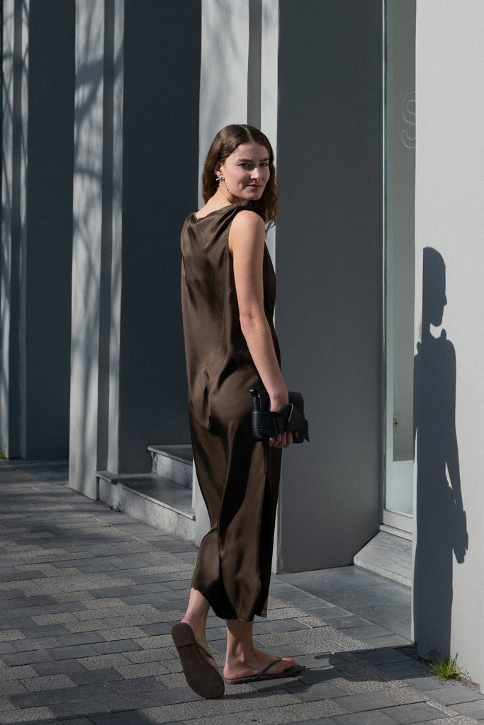 The Moun Dress by Loulou Studio is a cotton silk twill maxi dress with a drape knot detail on the shoulders