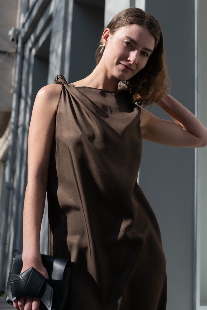 The Moun Dress by Loulou Studio is a cotton silk twill maxi dress with a drape knot detail on the shoulders