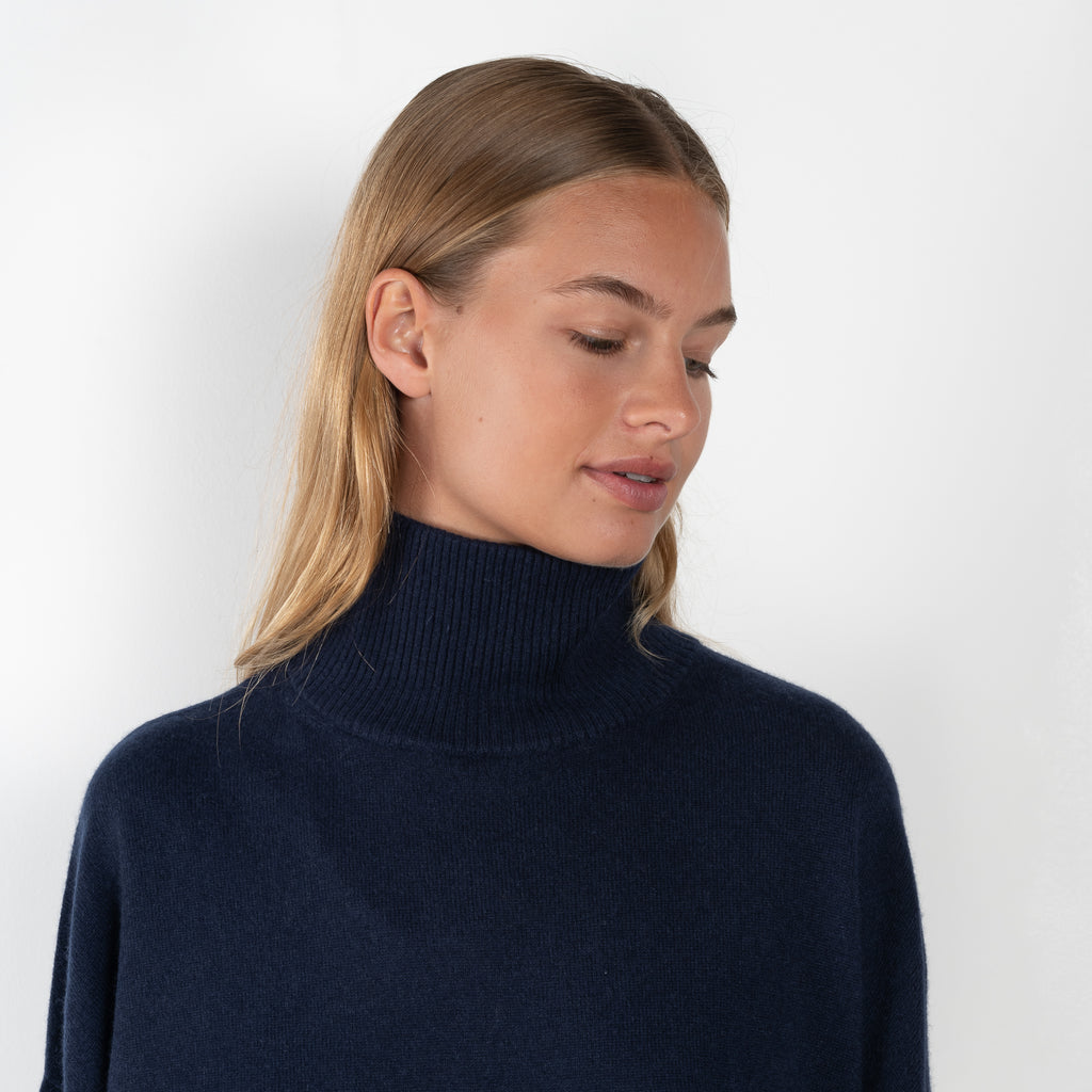 The Murano Sweater by Loulou Studio is a relaxed long sleeve sweater with a high standing neck in a soft cashmere