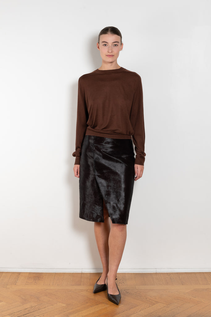 The Myra Skirt by Loulou Studio is a mid waist slit skirt in a pony effect calfskin leather