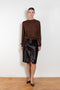 The Myra Skirt by Loulou Studio is a mid waist slit skirt in a pony effect calfskin leather