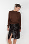 The Myra Skirt by Loulou Studio is a mid waist slit skirt in a pony effect calfskin leather