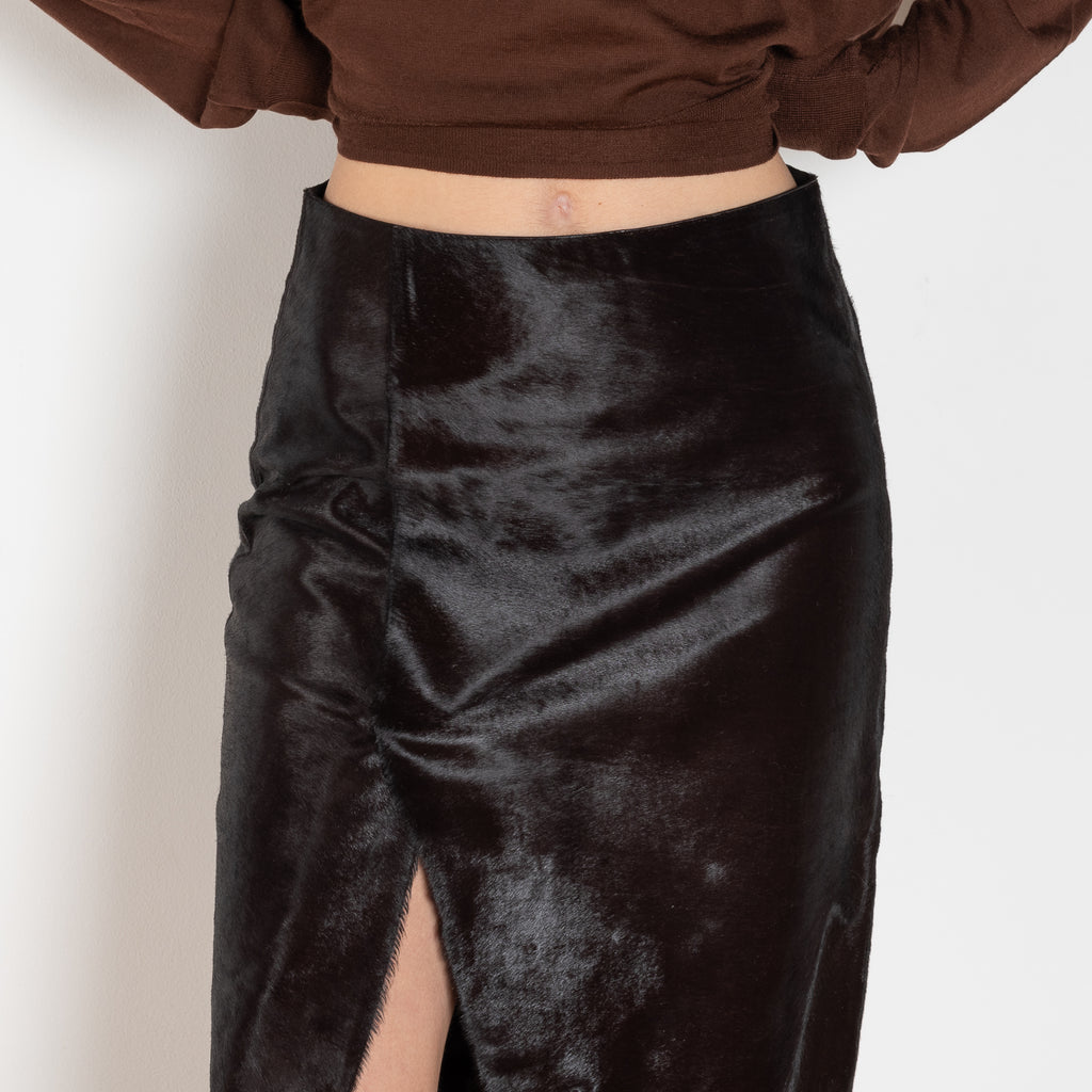 The Myra Skirt by Loulou Studio is a mid waist slit skirt in a pony effect calfskin leather