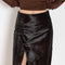 The Myra Skirt by Loulou Studio is a mid waist slit skirt in a pony effect calfskin leather