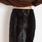 The Myra Skirt by Loulou Studio is a mid waist slit skirt in a pony effect calfskin leather