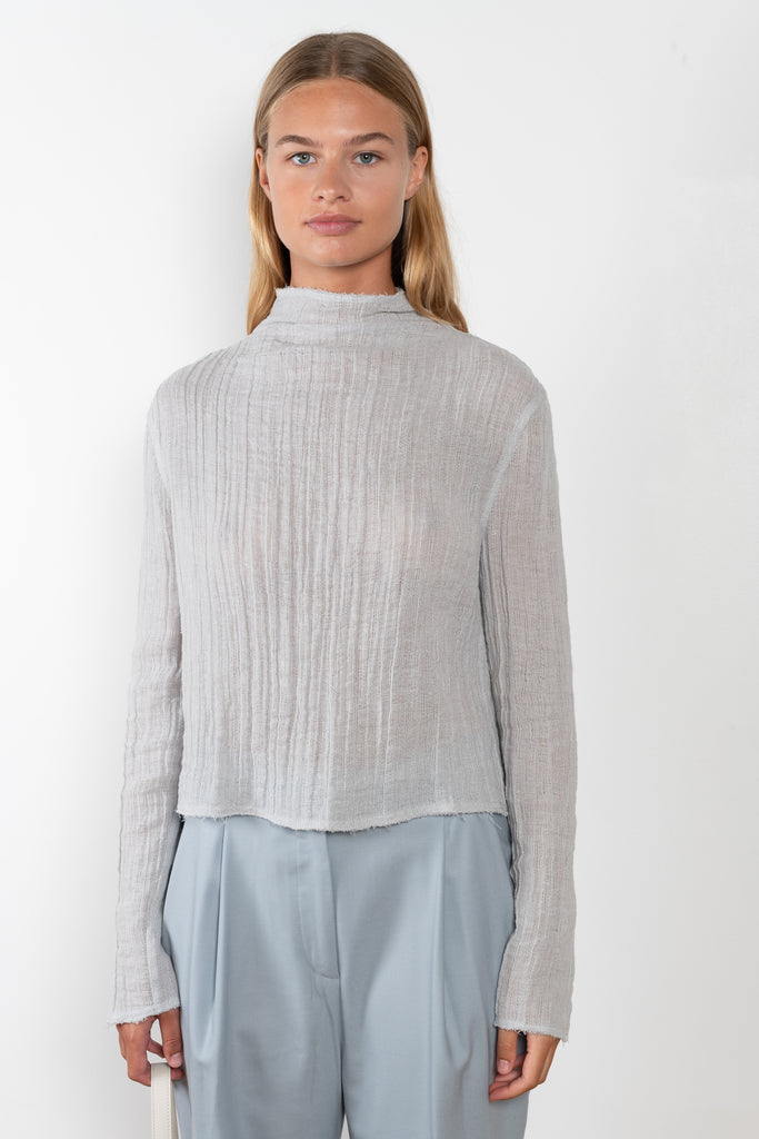 The Nagu Top by Loulou Studio is a lightweight top in  a linen blend with a high neckline