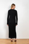 The Nosaro Dresss by Loulou Studio is a fitted long sleeve dress in a soft ribbed cashmere with a buttoned neckline