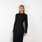 The Nosaro Dresss by Loulou Studio is a fitted long sleeve dress in a soft ribbed cashmere with a buttoned neckline