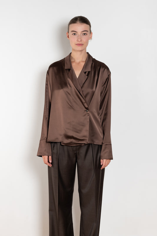The Persia Top by Loulou Studio is an elegant top with shirting inspired details in a viscose and wool satin