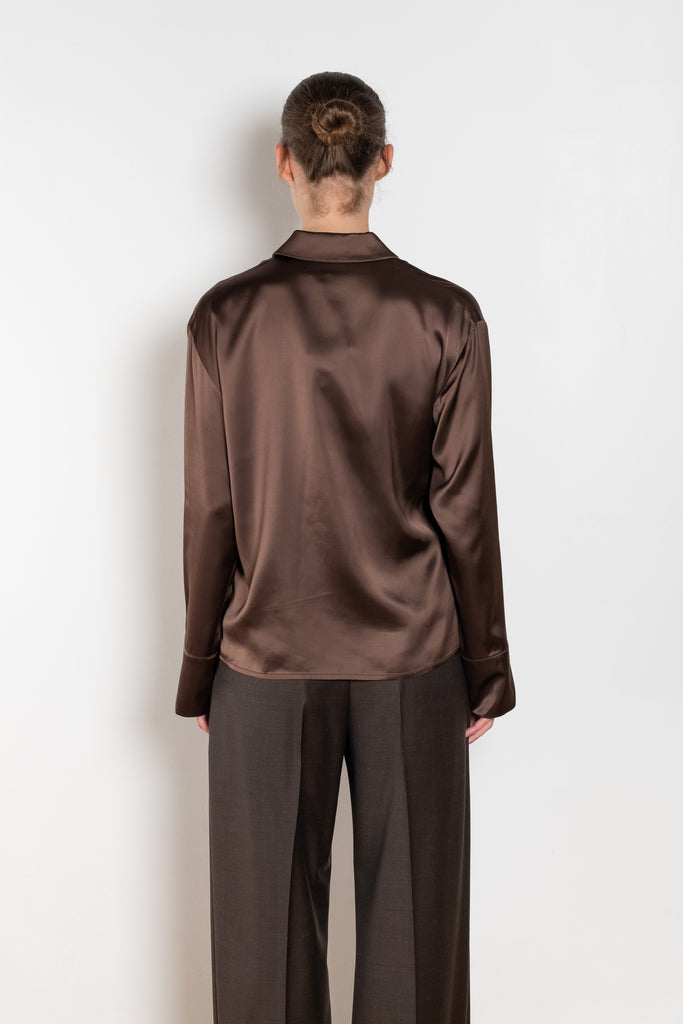 The Persia Top by Loulou Studio is an elegant top with shirting inspired details in a viscose and wool satin