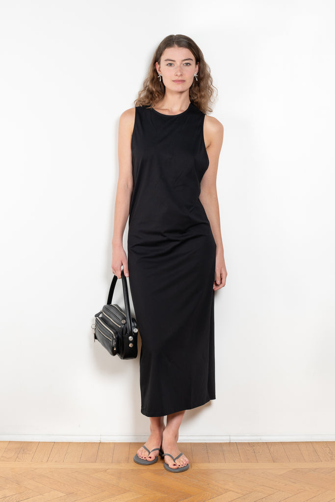 The Rayna Dress by Loulou Studio is a cotton jersey maxi dress with a cross knot detail on the back