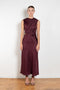 The Roan Dress by Loulou Studio is an elegant evening dress with a draped detail and hardware embellishment in a fluid silk twill