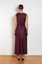 The Roan Dress by Loulou Studio is an elegant evening dress with a draped detail and hardware embellishment in a fluid silk twill