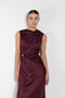 The Roan Dress by Loulou Studio is an elegant evening dress with a draped detail and hardware embellishment in a fluid silk twill