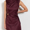 The Roan Dress by Loulou Studio is an elegant evening dress with a draped detail and hardware embellishment in a fluid silk twill
