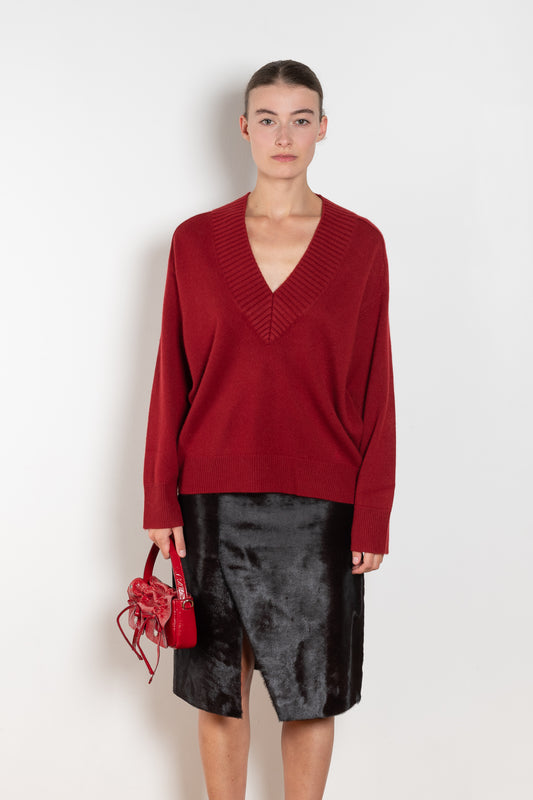 The Sage Sweater by Loulou Studio is an oversized sweater with an ample fit, a deep V, dropped shoulders and ribbed details in a thicker cashmere