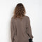 The Sage Sweater by Loulou Studio is an oversized sweater with an ample fit, a deep V, dropped shoulders