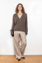 The Sage Sweater by Loulou Studio is an oversized sweater with an ample fit, a deep V, dropped shoulders