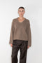 The Sbiru Pants by Loulou Studio are signature suiting paints that sit on the waist, are ample and pleated at the waist