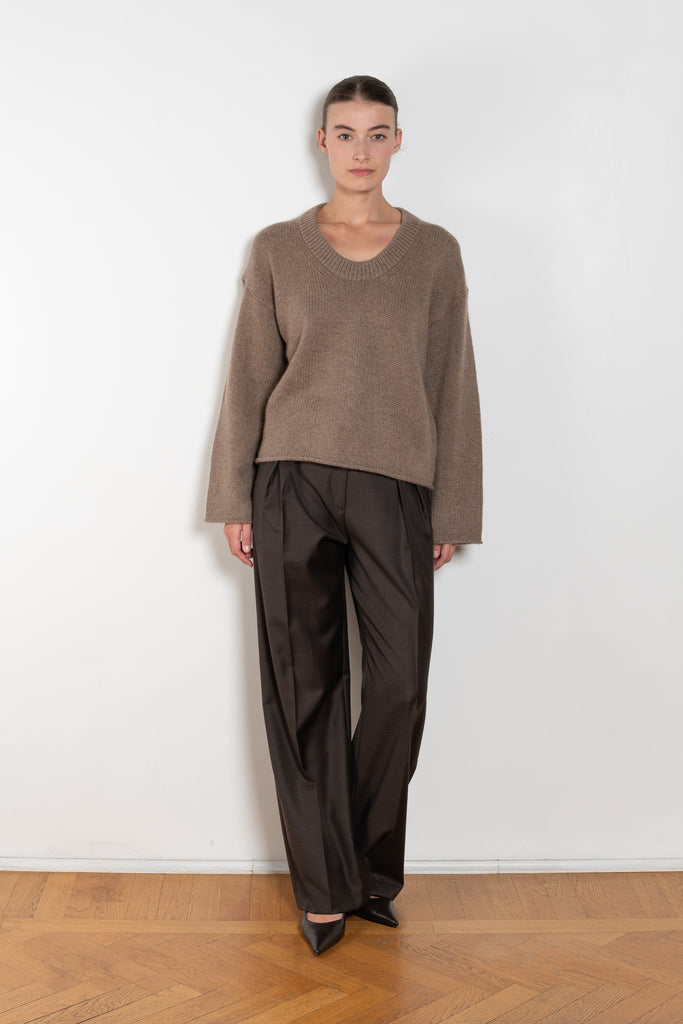 The Sbiru Pants by Loulou Studio are signature suiting paints that sit on the waist, are ample and pleated at the waist