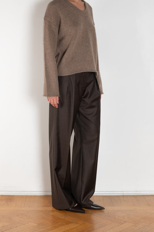 The Sbiru Pants by Loulou Studio are signature suiting paints that sit on the waist, are ample and pleated at the waist