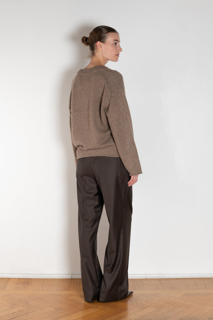 The Sbiru Pants by Loulou Studio are signature suiting paints that sit on the waist, are ample and pleated at the waist