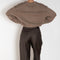The Sbiru Pants by Loulou Studio are signature suiting paints that sit on the waist, are ample and pleated at the waist