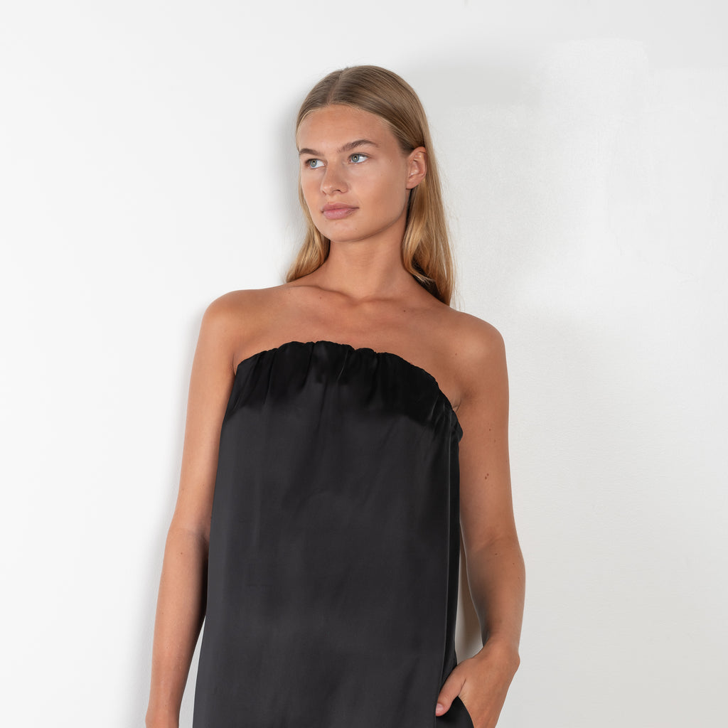 The Siple Dress by Loulou Studio is a minimal elegant satin bustier dress with side pockets