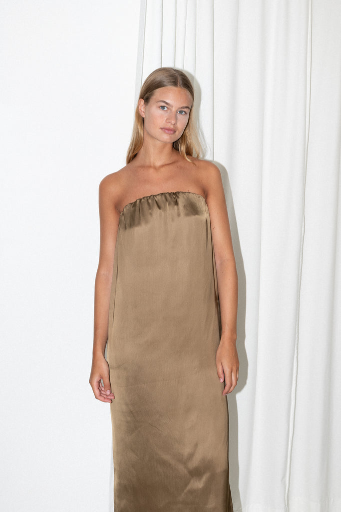 The Siple Dress by Loulou Studio is a minimal elegant satin bustier dress with side pockets