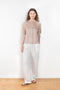 The Soler Trouser by Loulou Studio are textured brushed trousers made of a silk cotton blend with a straight relaxed fit
