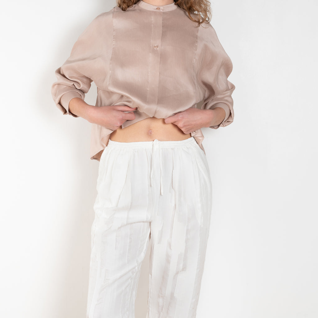 The Soler Trouser by Loulou Studio are textured brushed trousers made of a silk cotton blend with a straight relaxed fit