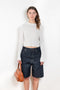 The Tinos Top by Loulou Studio is a cropped knit with a lace pattern