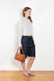 The Tinos Top by Loulou Studio is a cropped knit with a lace pattern