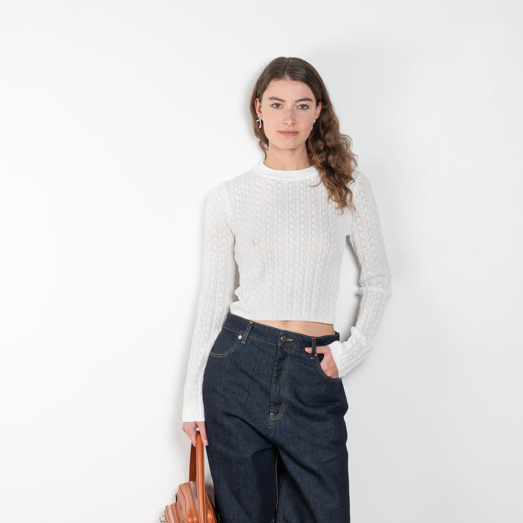The Tinos Top by Loulou Studio is a cropped knit with a lace pattern