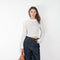 The Tinos Top by Loulou Studio is a cropped knit with a lace pattern