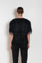 The Zaro Top by Loulou Studio is a short sleeve top with a round neck and long fringes