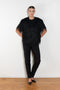 The Zaro Top by Loulou Studio is a short sleeve top with a round neck and long fringes
