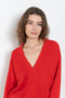 The Sage Sweater by Loulou Studio is an oversized sweater with an ample fit, a deep V, dropped shoulders and ribbed details