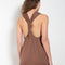 The Rayna Dress by Loulou Studio is a cotton jersey maxi dress with a cross knot detail on the back